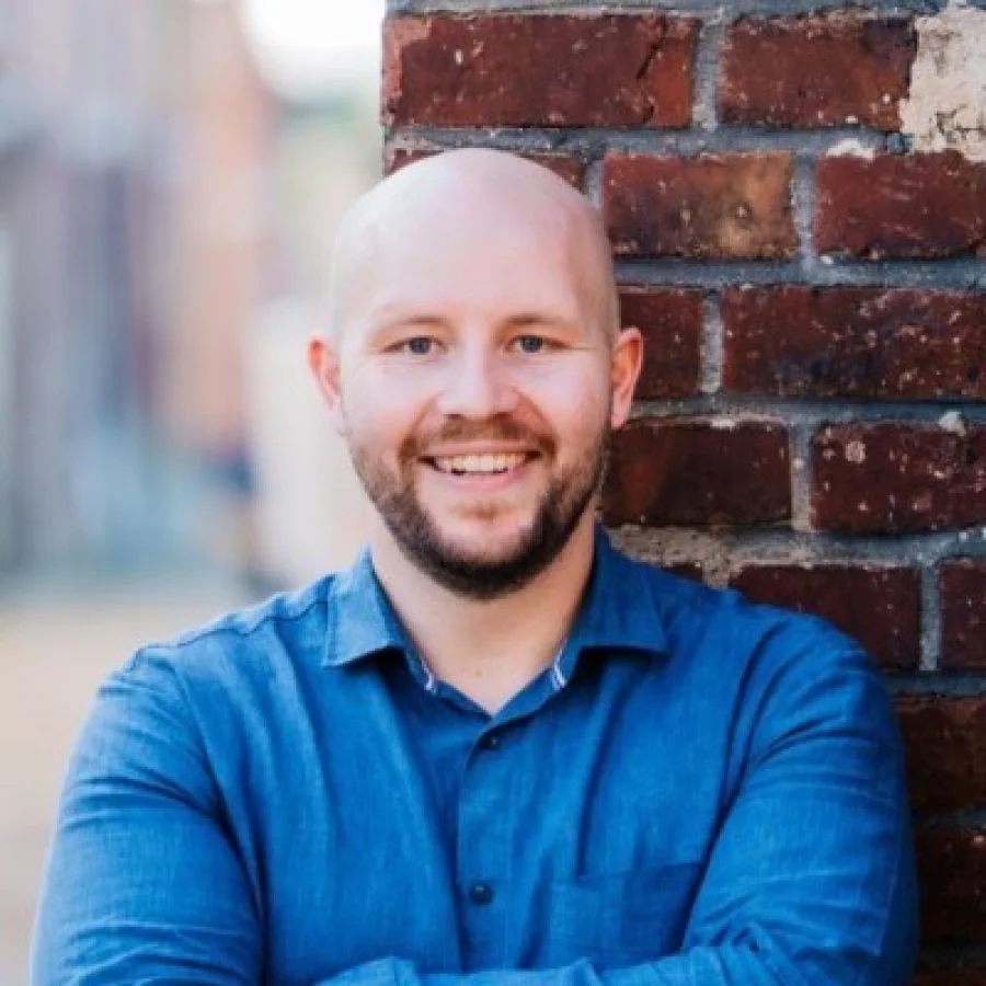 Dr. Tim Reuscher